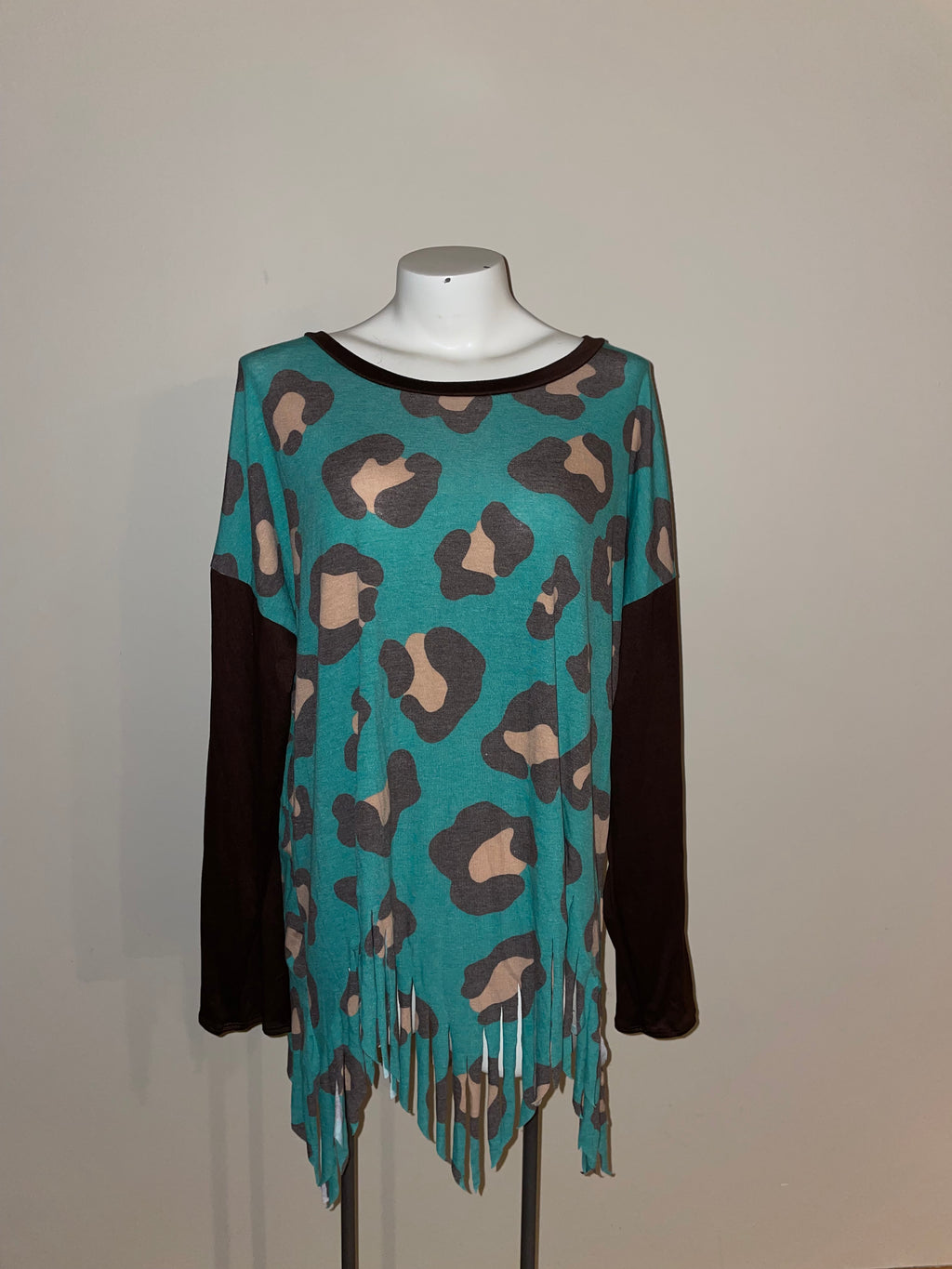 Leopard print, fringe hem, blouse Size medium